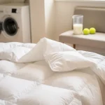Piumone pulito e soffice senza rovinarlo: il metodo semplice che funziona davvero in lavatrice
